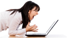 Woman yelling at a laptop